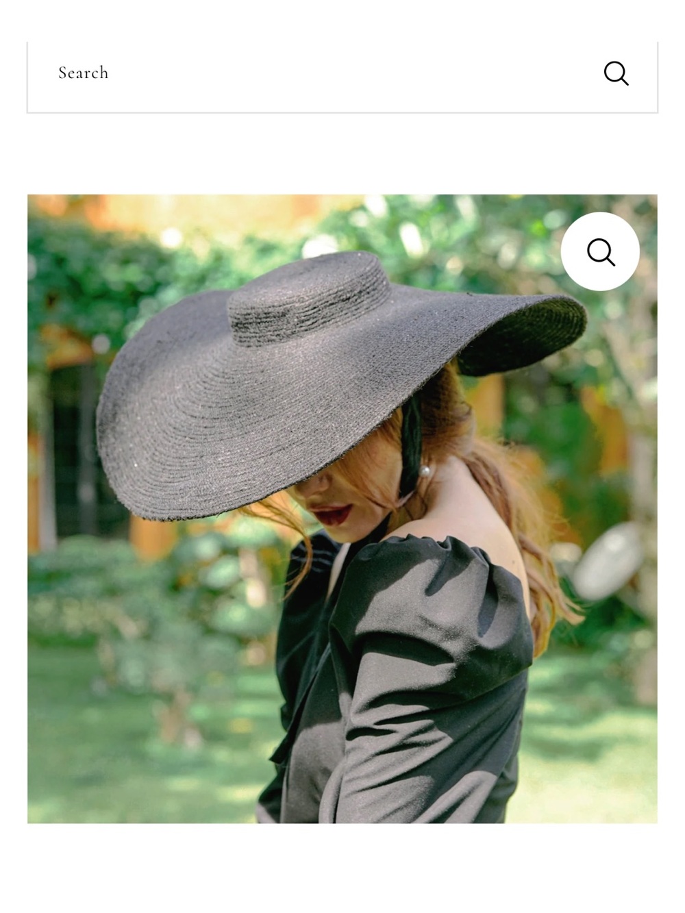 Elegant Black Wide-Brim Women's Straw Hat with Chin Tie